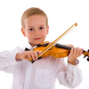 boy plays on violin